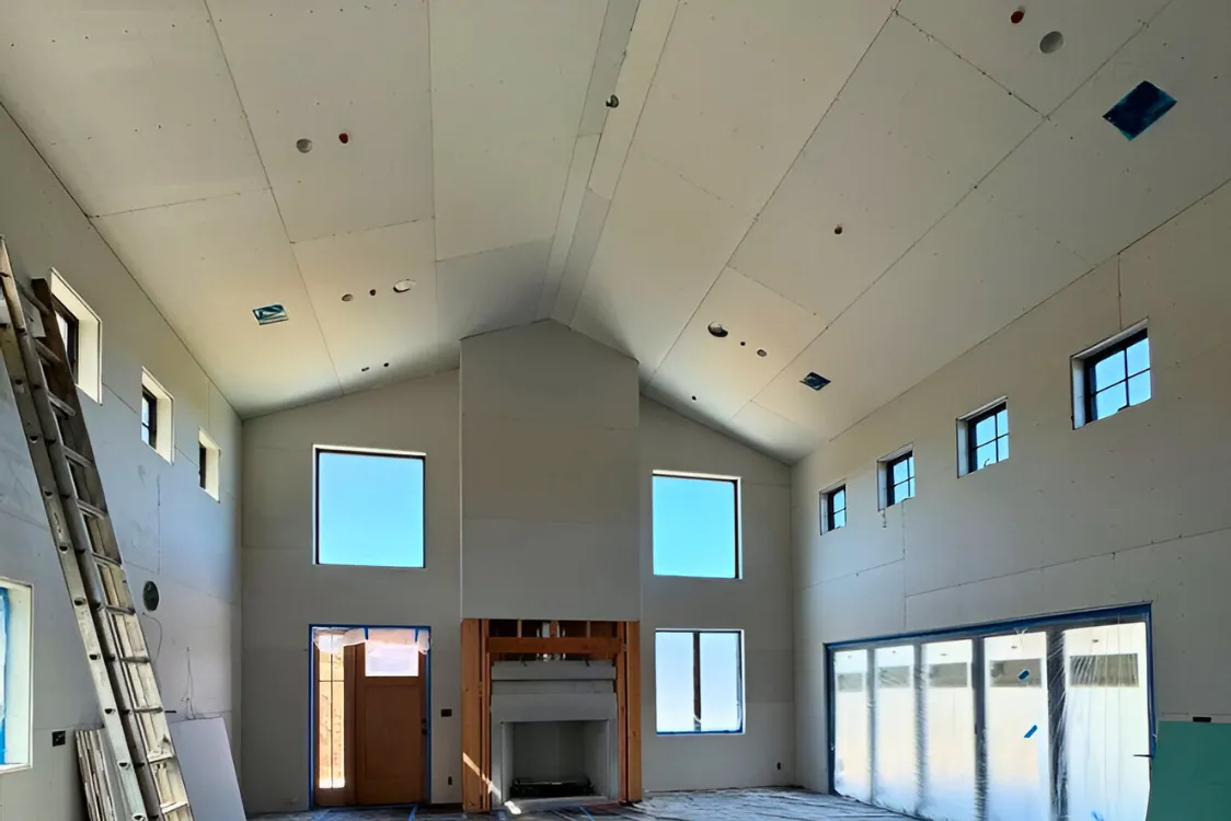 "Professional drywall installation in residential home in New Bedford"